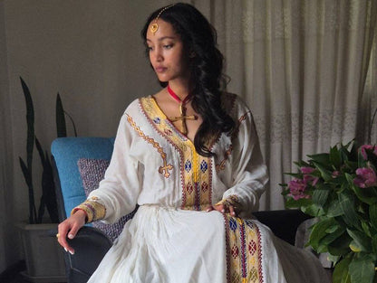 Simple Cross-Stitched Habesha Dress: with Multicolor Ornaments Traditional Ethiopian Dress