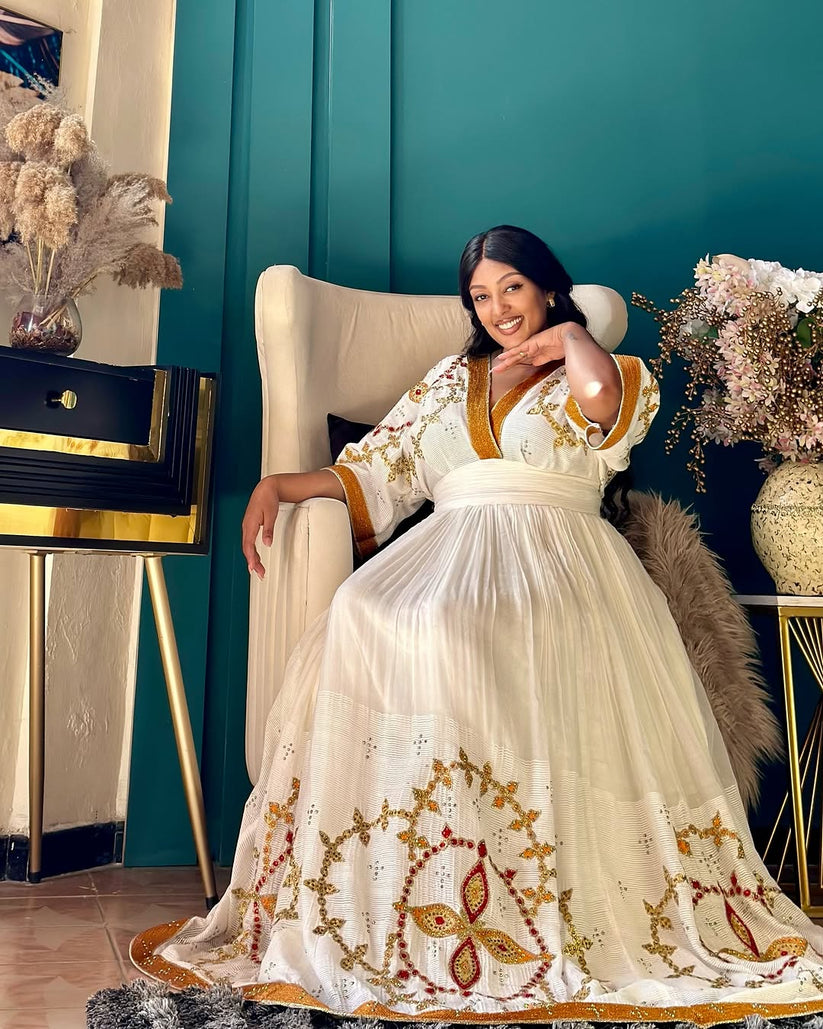 Luxiourous Gold Habesha Libs – Vibrant Ethiopian Outfit for Special Ceremonies