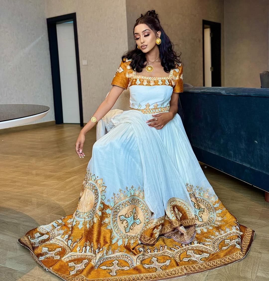 Shimmering Gold in Traditional Ethiopian Dress: Newly Designed Habesha Dress Beautifully Handcrafted Eritrean Clothing