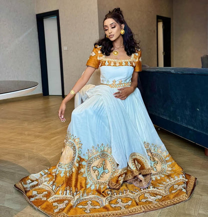 Shimmering Gold in Traditional Ethiopian Dress: Newly Designed Habesha Dress Beautifully Handcrafted Eritrean Clothing