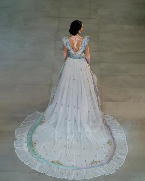 Glorious Blue Based Habesha Wedding Dress: Deep V-Neck, Shoulder Pad Traditional Ethiopian Wedding Dress