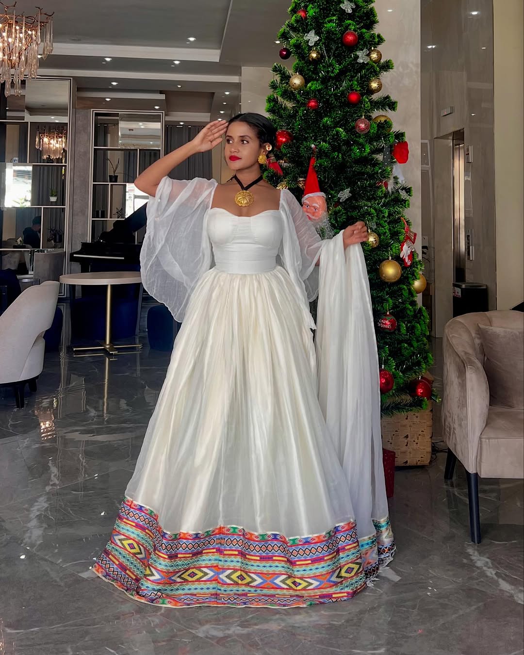 Stylish Flowy Ethiopian Dress: Multicolored Embroidery Around the Hemline on Ethiopian Clothing Beautiful Habesha Kemis