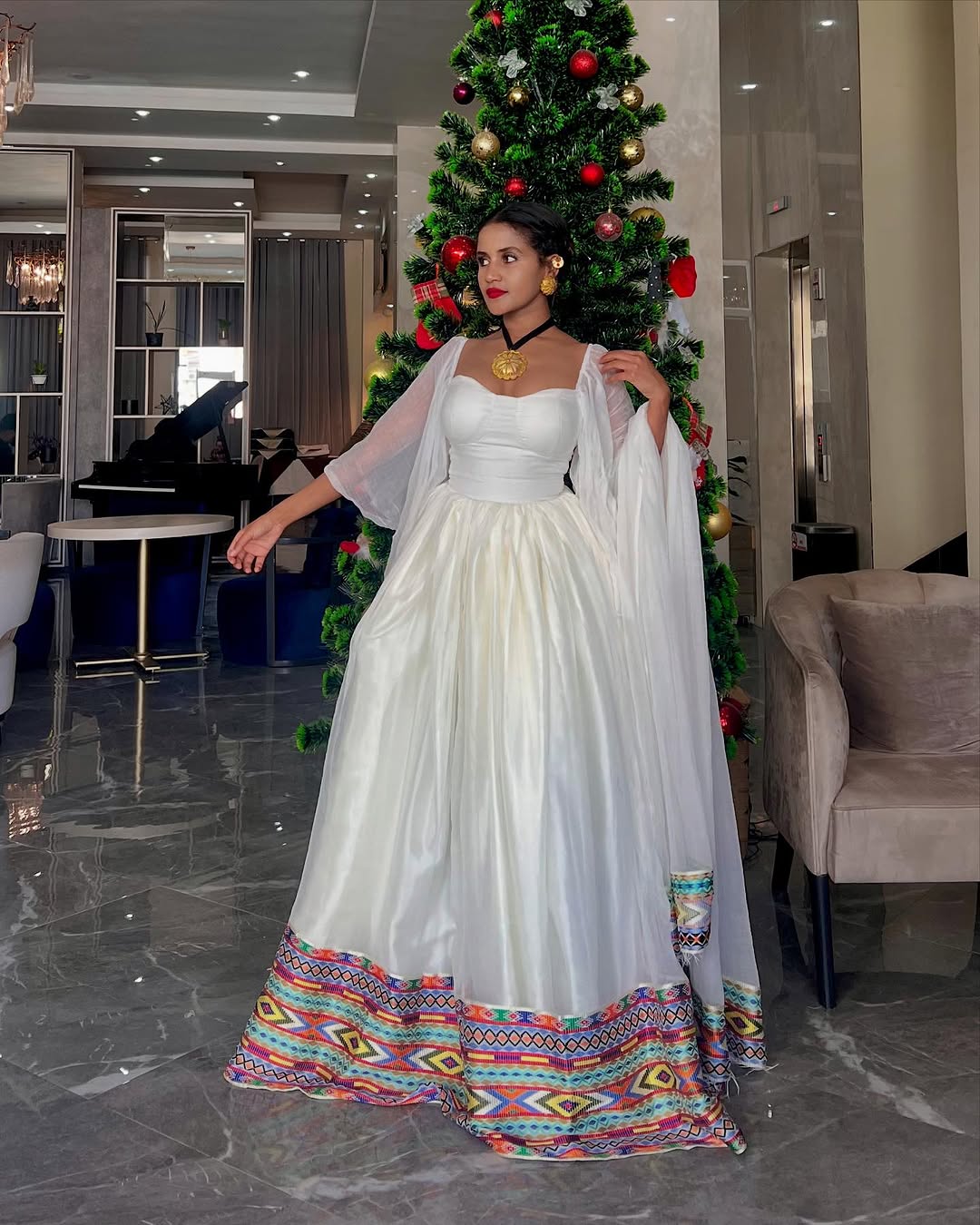 Stylish Flowy Ethiopian Dress: Multicolored Embroidery Around the Hemline on Ethiopian Clothing Beautiful Habesha Kemis