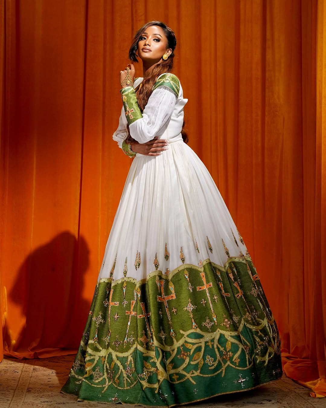 Elegant Green Ethiopian Bridal Habesha Kemis with Wide Embroidery and Detailed Design