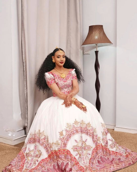 Elegant Pink Habesha Wedding Dress with Exquisite Detailing Habesha Kemis