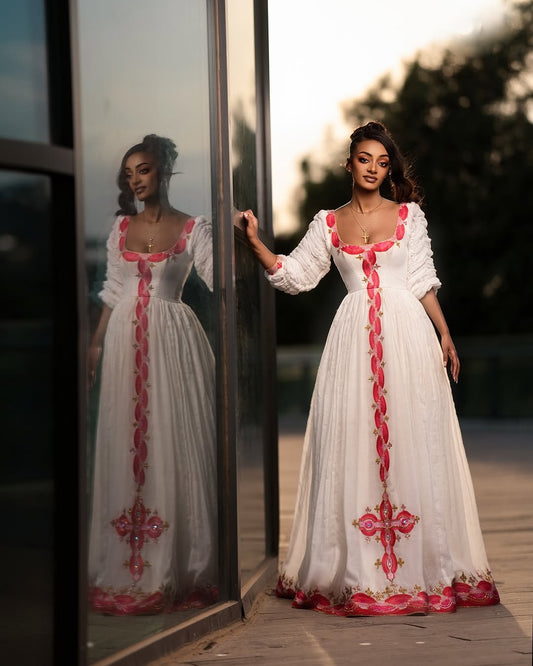 Luxury Pink Delicate Habesha Dress with Modern Styling and Exquisite Detailing