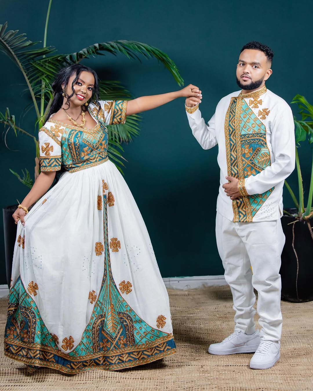 Flawless Green Habesha Couples Wedding Outfit with Golden Accents
