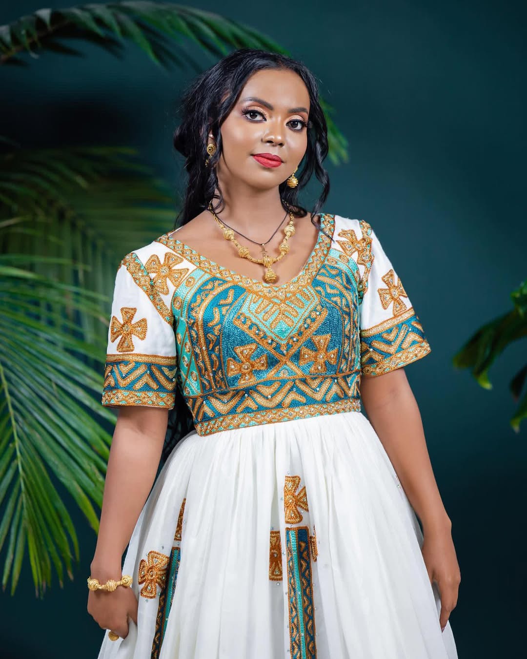 Flawless Green Habesha Couples Wedding Outfit with Golden Accents