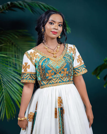 Flawless Green Habesha Couples Wedding Outfit with Golden Accents