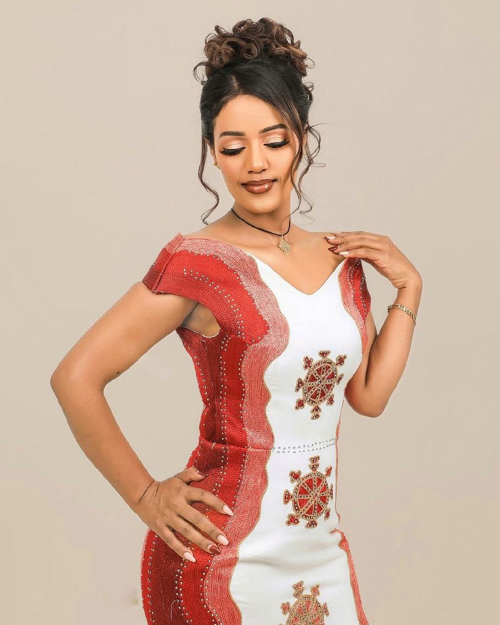 Stunning Mermaid Habesha Dress Golden and Red Detailed Design