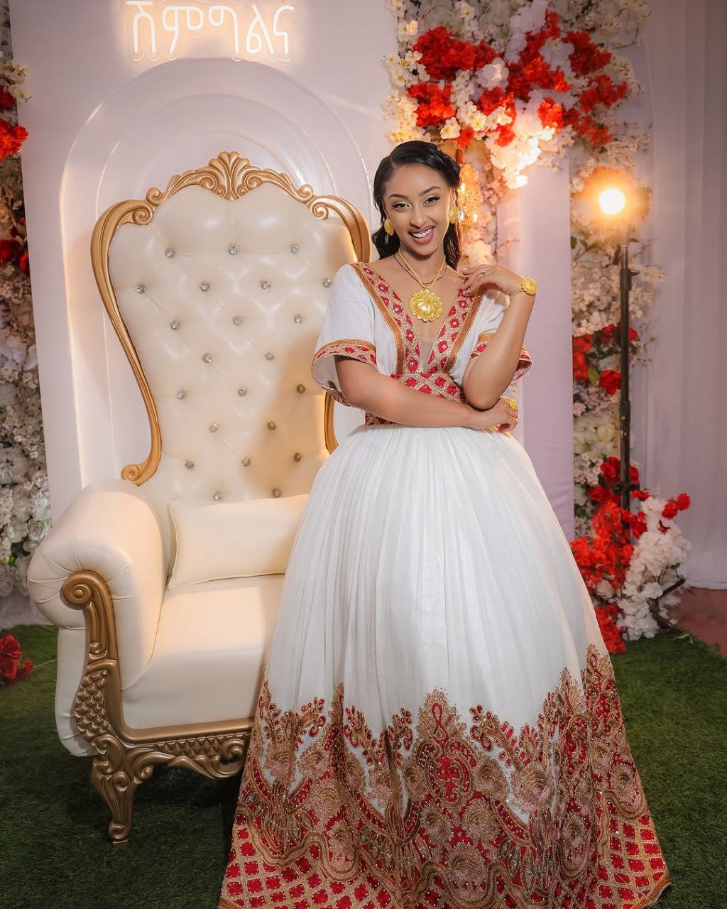 Modern Habesha Wedding Dress: Glowing in Radiant Red and Golden Embroidery