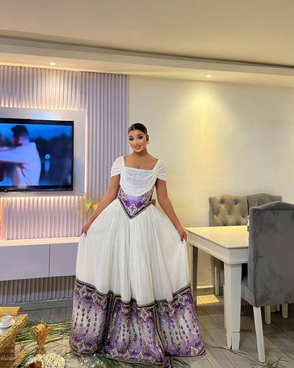 Timeless Habesha Kemis with Vibrant Purple Accents for Lasting Style