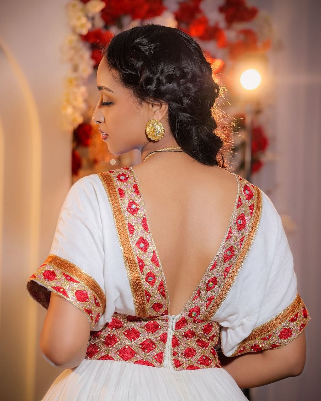 Modern Habesha Wedding Dress: Glowing in Radiant Red and Golden Embroidery