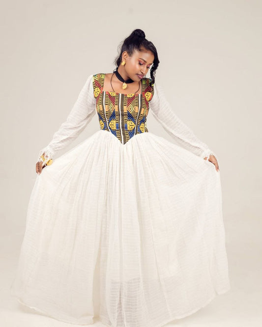 Stylish Habesha Dresses with Colorful Neck Embroidery and Ethiopian Motifs for Occasions