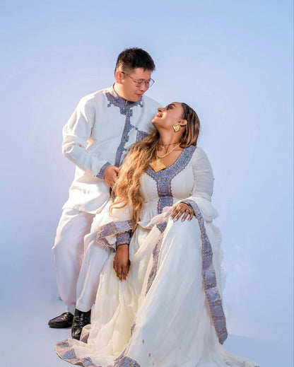 Elegant Habesha Couple Outfit with Soft Lavender Embroidery for Ethiopian Weddings