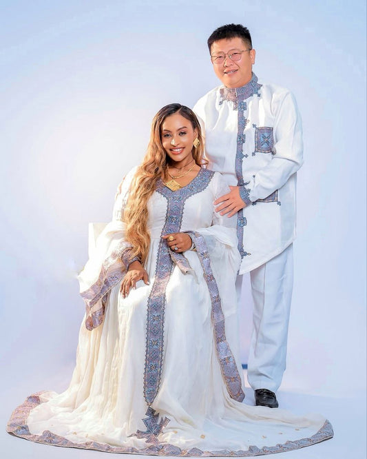 Elegant Habesha Couple Outfit with Soft Lavender Embroidery for Ethiopian Weddings