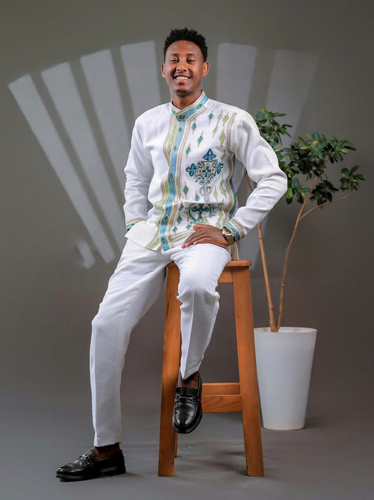 Elegant Ethiopian Men’s Outfit with Blue and Green Cross Motifs for Celebrations









