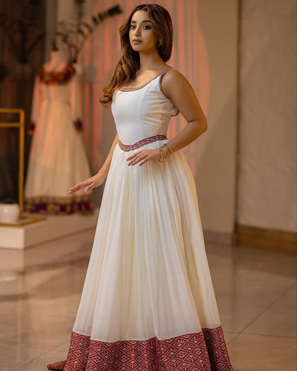 Chic Minimalist Habesha Dress with Elegant Red Border for Stylish Events
