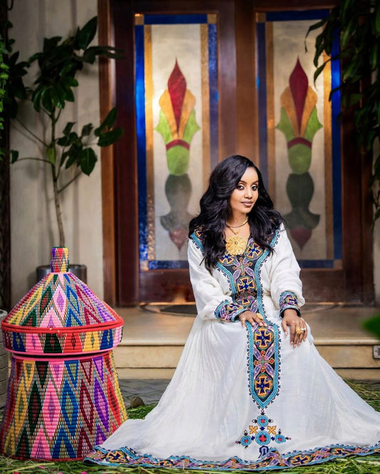Elegant Habesha Dress with Bold Blue Embroidery for Church Ceremonies and Cultural Events

