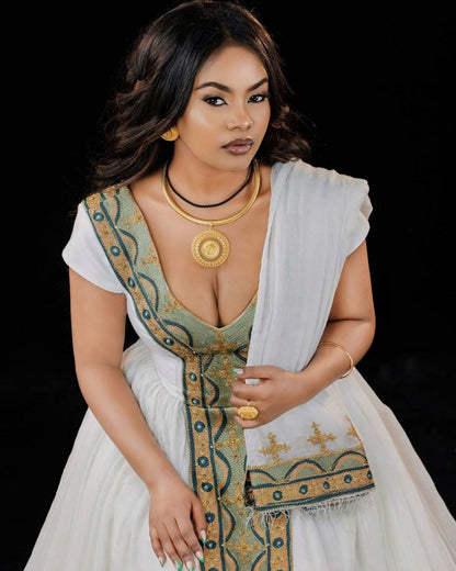 Chic Traditional Ethiopian Dress with Gold and Green Embroidered Kemis for Cultural Celebration