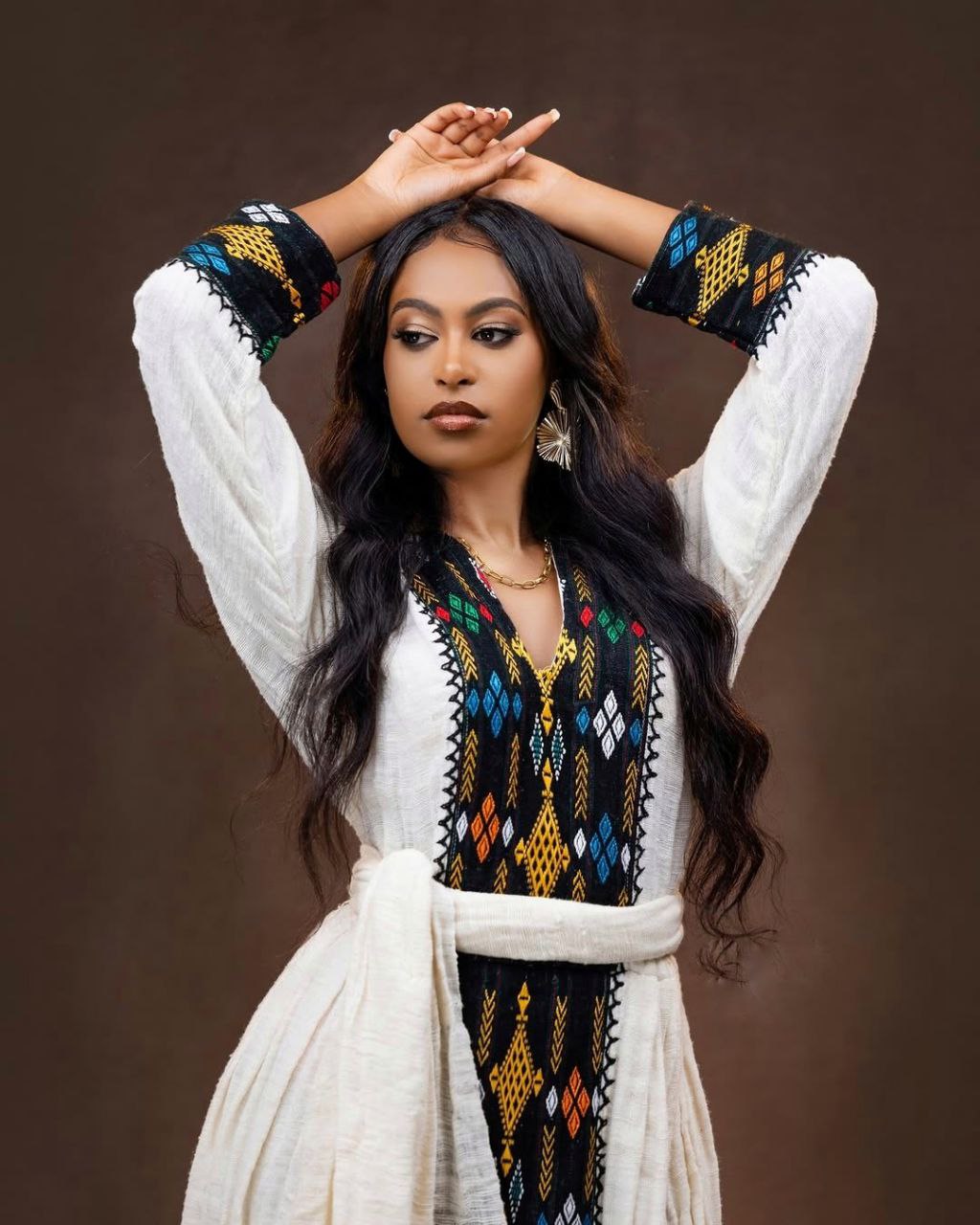 Bold Habesha Dress with Black and Multicolor Embroidery for Traditional Cultural Events