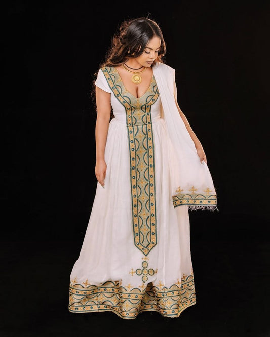Chic Traditional Ethiopian Dress with Gold and Green Embroidered Kemis for Cultural Celebration
