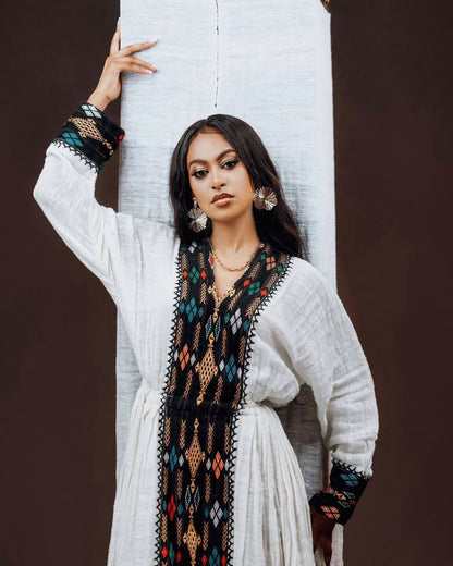 Bold Habesha Dress with Black and Multicolor Embroidery for Traditional Cultural Events