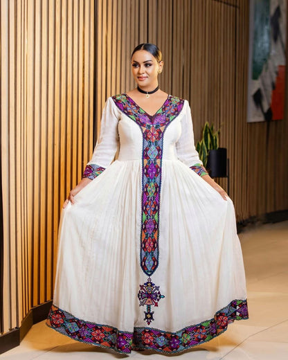 Colorful Habesha Dress with Multicolor Cross Embroidery for Special Occasions
