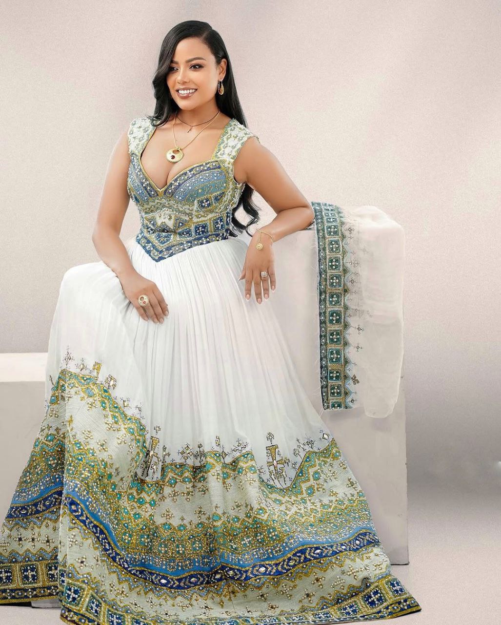 Elegant Habesha Kemis with Gold, Green and Sea Blue Details for Wedding and Events