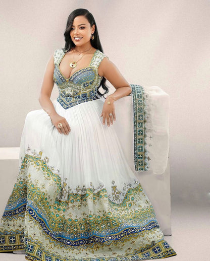Elegant Habesha Kemis with Gold, Green and Sea Blue Details for Wedding and Events