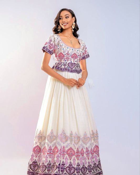 Elegant Habesha Kemis with Pink and Plum Embroidery for Wedding Celebrations
