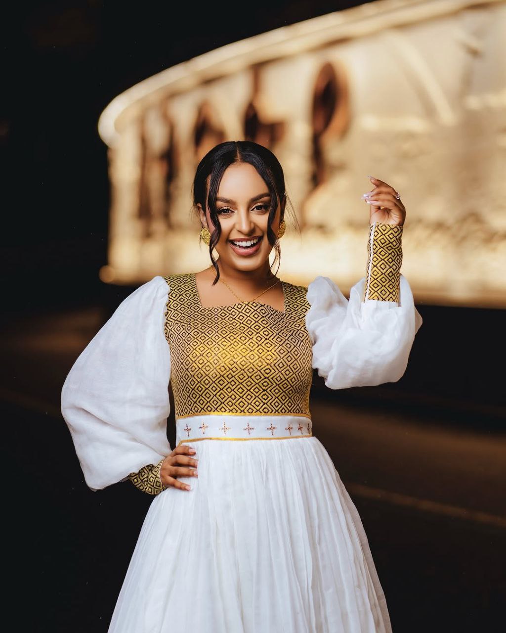 Vibrant Gold Bodice Habesha Dress with Flowing Skirt for an event