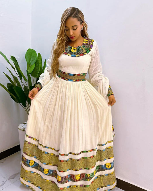 Beautiful Ethiopian Dress with Colorful Tibeb Details For Cultural Celebration
