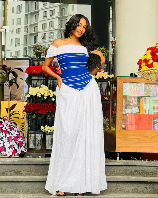 Simple Modern Habesha Dress with Bold Blue Bodice for Everyday Elegance and Cultural Gatherings

