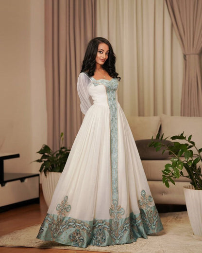 Elegant Habesha Dress with Aqua Blue Embroidery for Special Occasions
