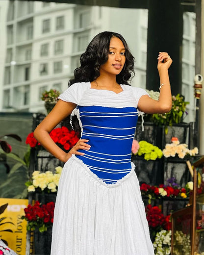 Simple Modern Habesha Dress with Bold Blue Bodice for Everyday Elegance and Cultural Gatherings