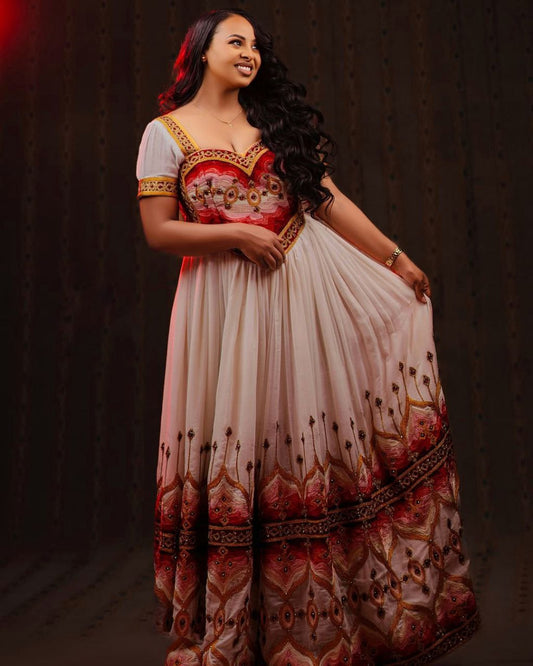 Elegant Habesha Dress with Rich Red and Gold Embroidery for Weddings
