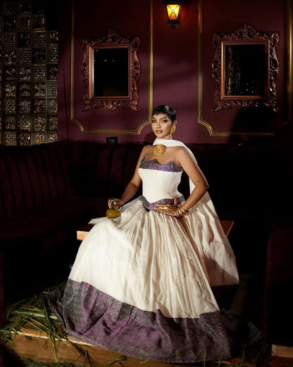 Stunning Habesha Dress with Elegant Purple Accents for Special Occasions