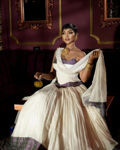 Stunning Habesha Dress with Elegant Purple Accents for Special Occasions
