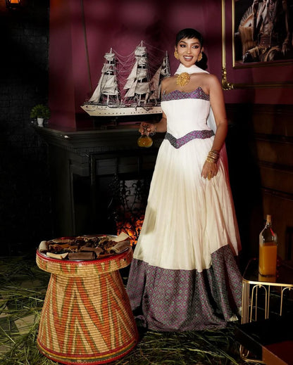 Stunning Habesha Dress with Elegant Purple Accents for Special Occasions