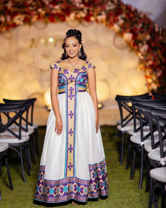 Stunning Habesha Wedding Dress with Colorful Embroidery For Weddings
