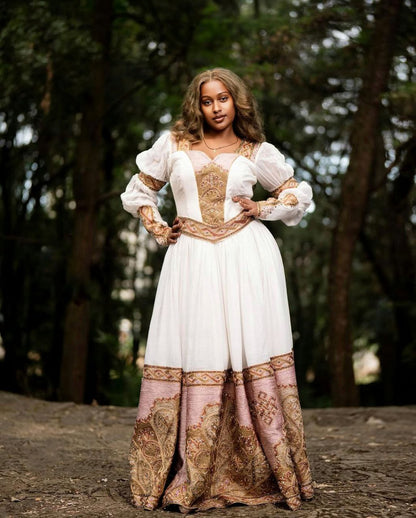 Beautiful Habesha Dress with Elegant Pink and Gold Embroidery for Weddings