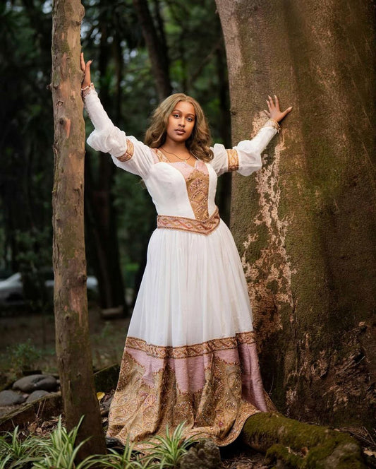 Beautiful Habesha Dress with Elegant Pink and Gold Embroidery for Weddings