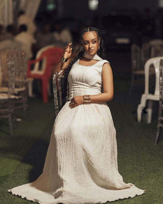 Simple Habesha Dress with Textured Fabric for Special Events

