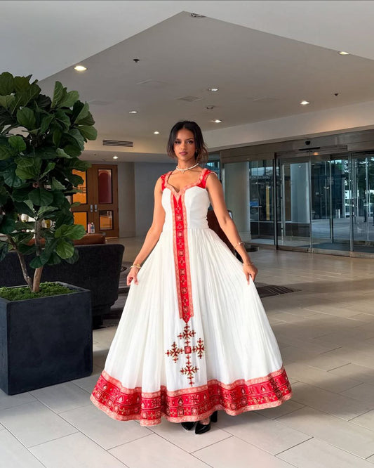 Stunning Habesha Kemis with Intricate Red Embroidery a Perfect Choice for Cultural Celebrations
