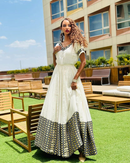 Stylish Habesha Kemis with Geometric Patterns and Puff Sleeves for Event - Ethiopian Clothing - Habesha Clothing
