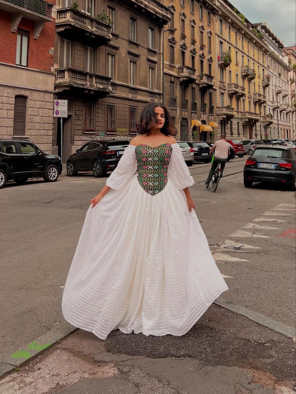 Vibrant Off-Shoulder Habesha Kemis Elegant Ethiopian Dress with Multi-Color Embroidered Bodice
