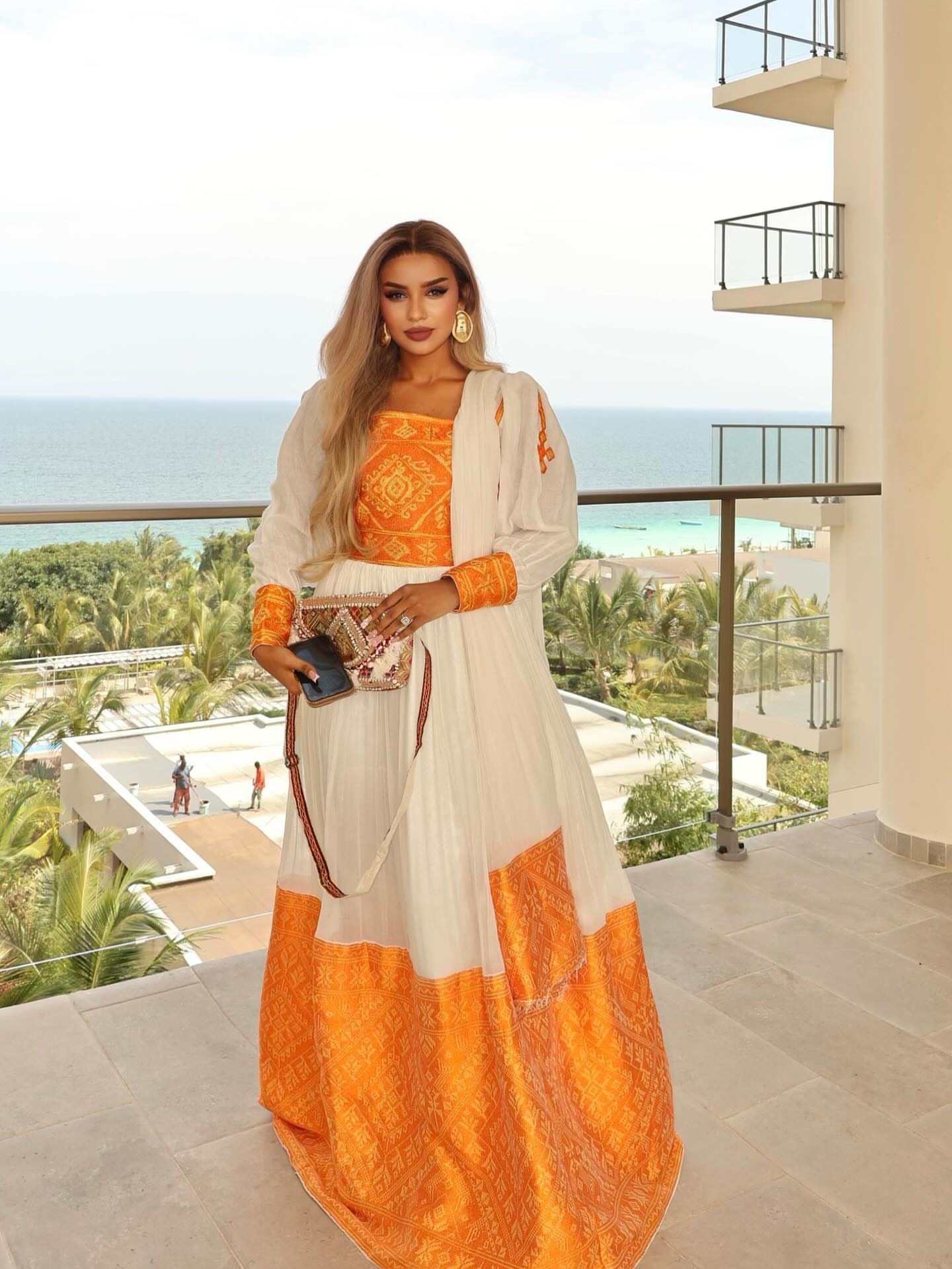 Elegant Habesha Kemis Vibrant Orange Ethiopian Dress