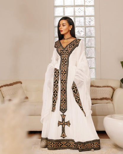White Habesha Kemis with Bold Black & Gold Tibeb Embroidery