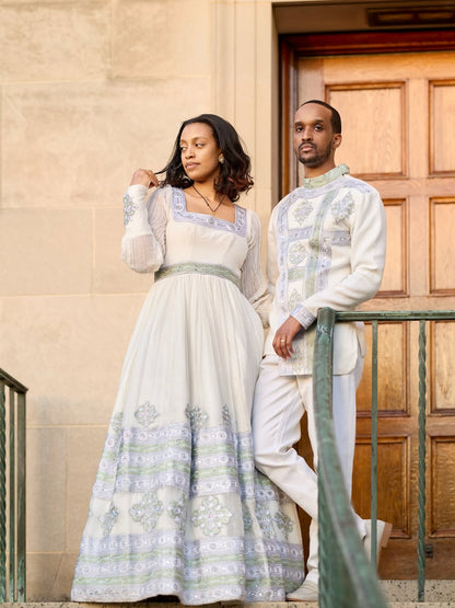 Elegant Ethiopian Traditional Couple Outfit in White with Silver Embroidery

